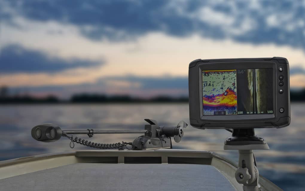 Image of a trolling motor and a fish finder on a bass boat.