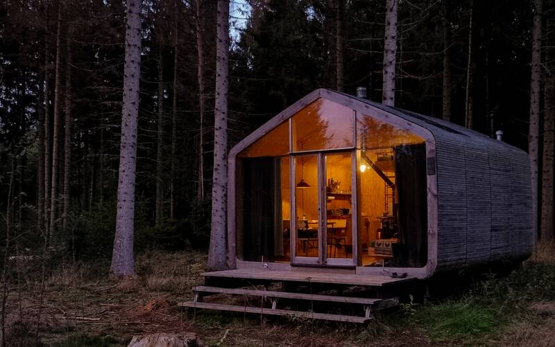 Cabin in the woods with solar system.