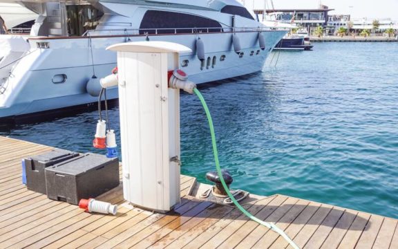 Docked boat charging batteries.