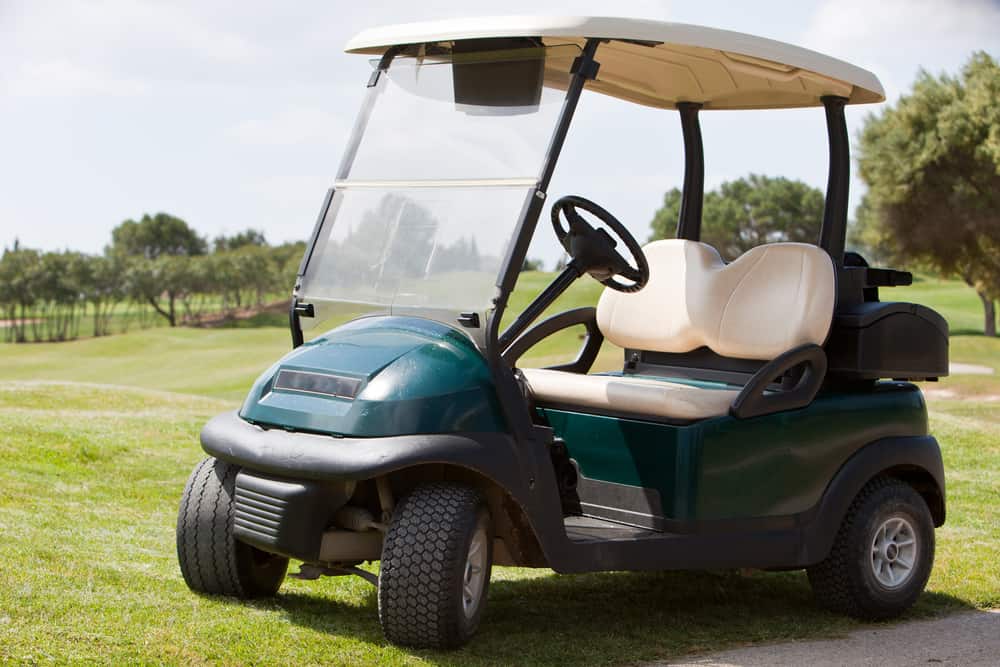 golf cart parked on a fairway