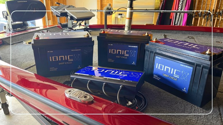Ionic lithium deep cycle marine batteries and an Ionic on-board charger on the bow of a bass boat