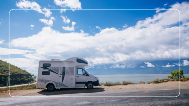 Motorhome parked at a scenic overlook, powered by RV lithium house batteries for off-grid camping
