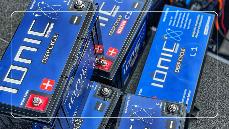 Ionic lithium deep cycle batteries including a heated cold-weather model with Bluetooth monitoring