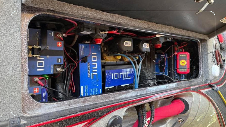 Ionic lithium batteries wired into a bass boat battery compartment with battery switches