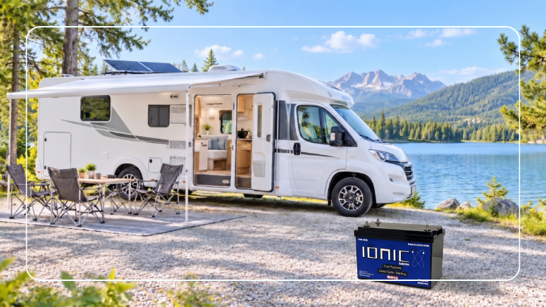 Camper van with rooftop solar panels parked by a mountain lake with an Ionic lithium RV battery